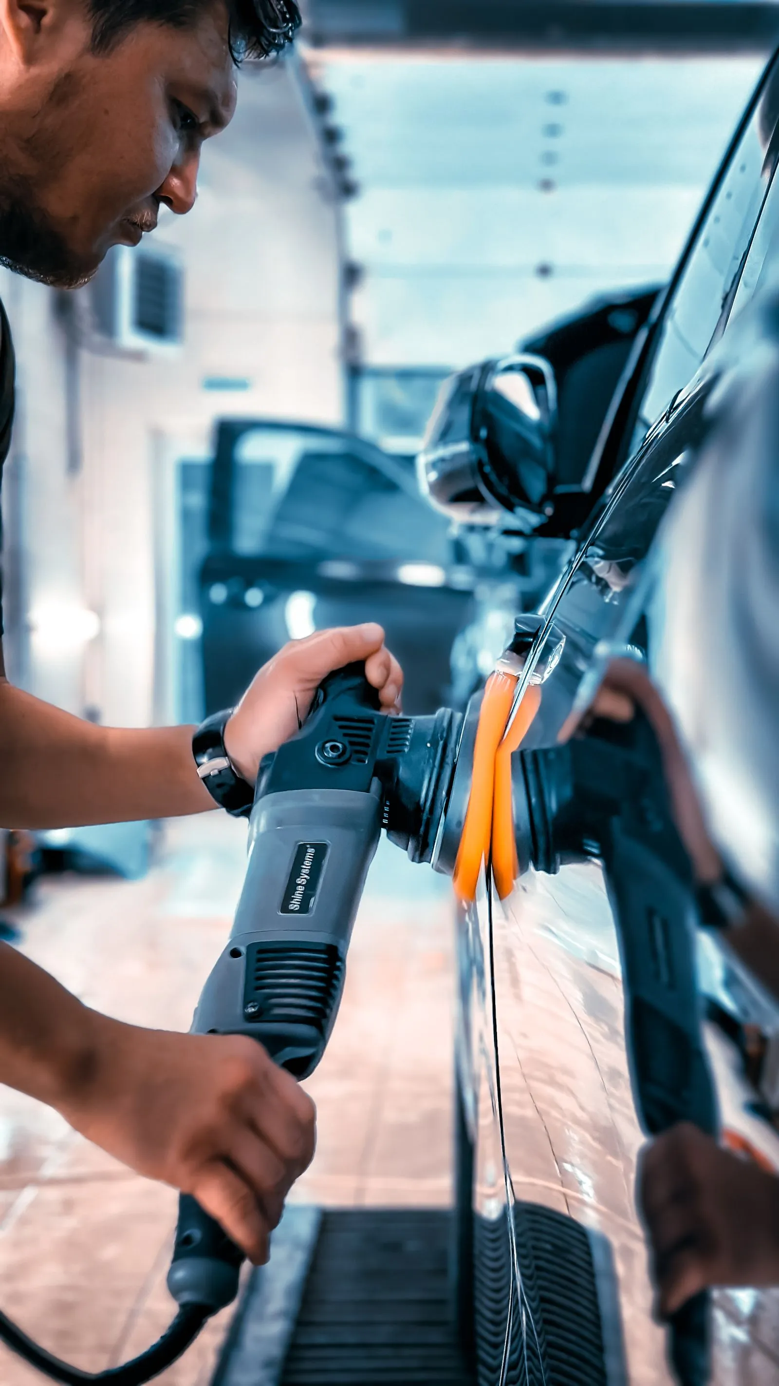 Dual-action polisher on the paint